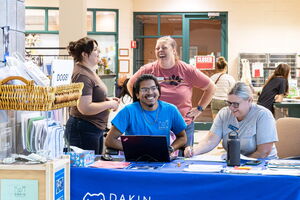 Dakin staff and volunteers have a laugh between duties