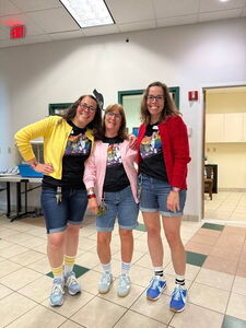 Dakin staff in blue jean shorts/sweaters Twin Day costumes for Spirit Week