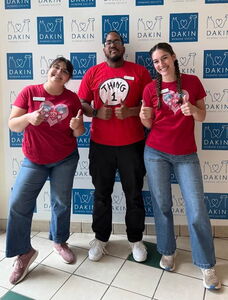 Three Dakin staff members dressed up for Twin Day, part of Spirit Week
