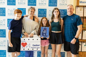 Family leaving Dakin with new cat