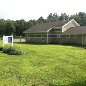 An outdoor photo of the side of the Leverett Adoption Center